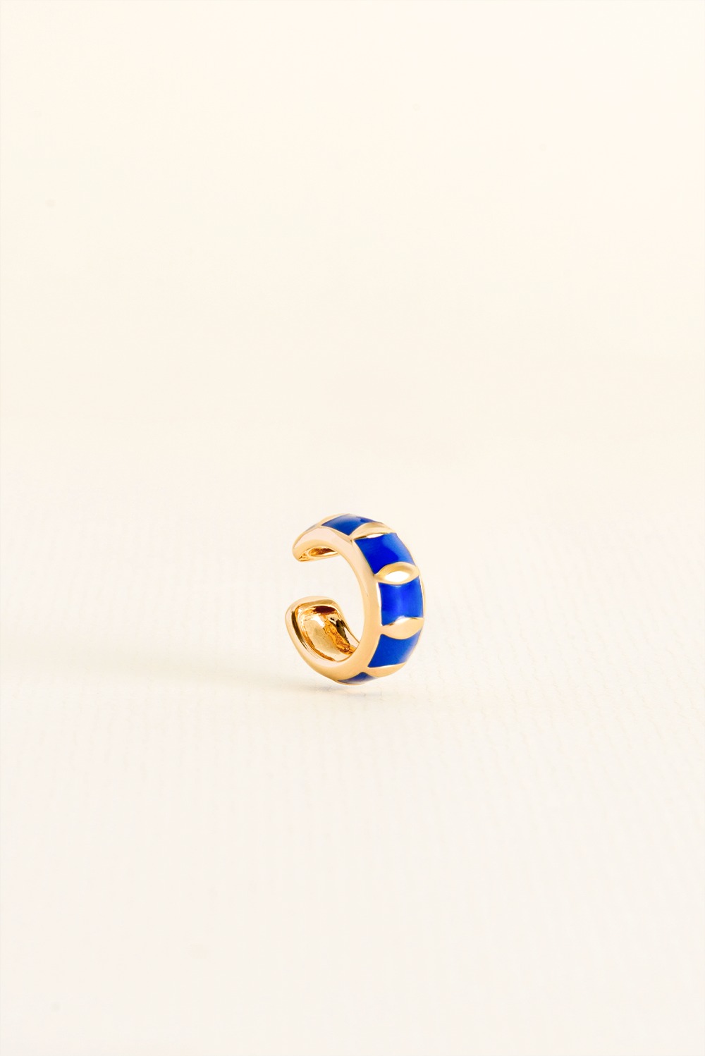 PIERCING INTUIÇÃO AZUL ESMALTADO DOURADO