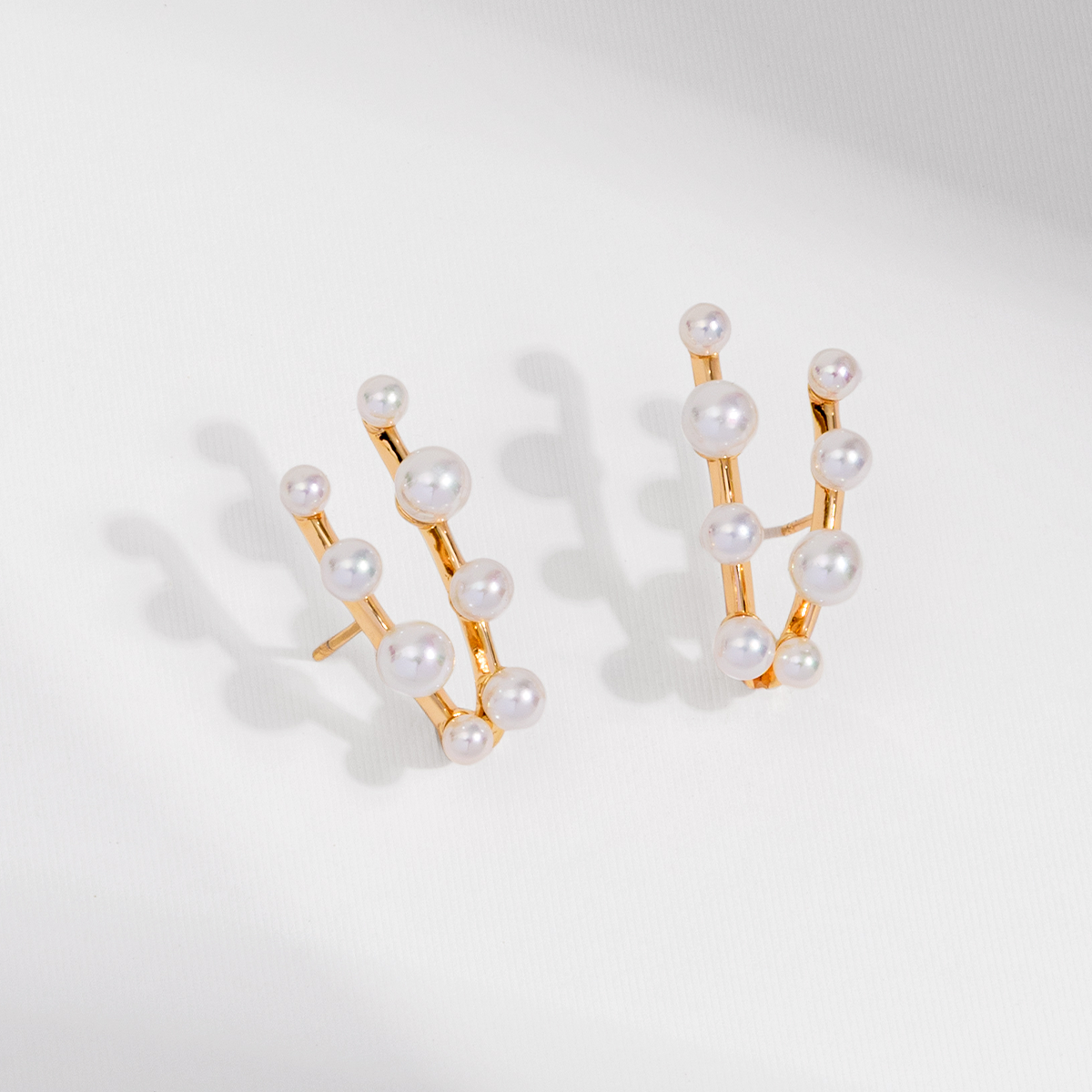 BRINCO HALO PÉROLAS DUPLO DOURADO