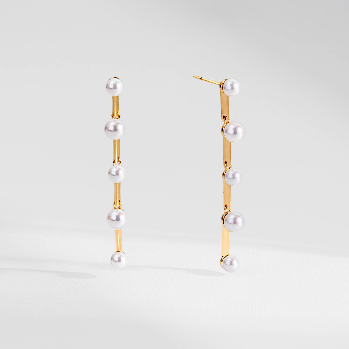 BRINCO PÉROLAS HALO DOURADO