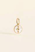PINGENTE CHARM BAR OLHO MADREPEROLA DOURADO
