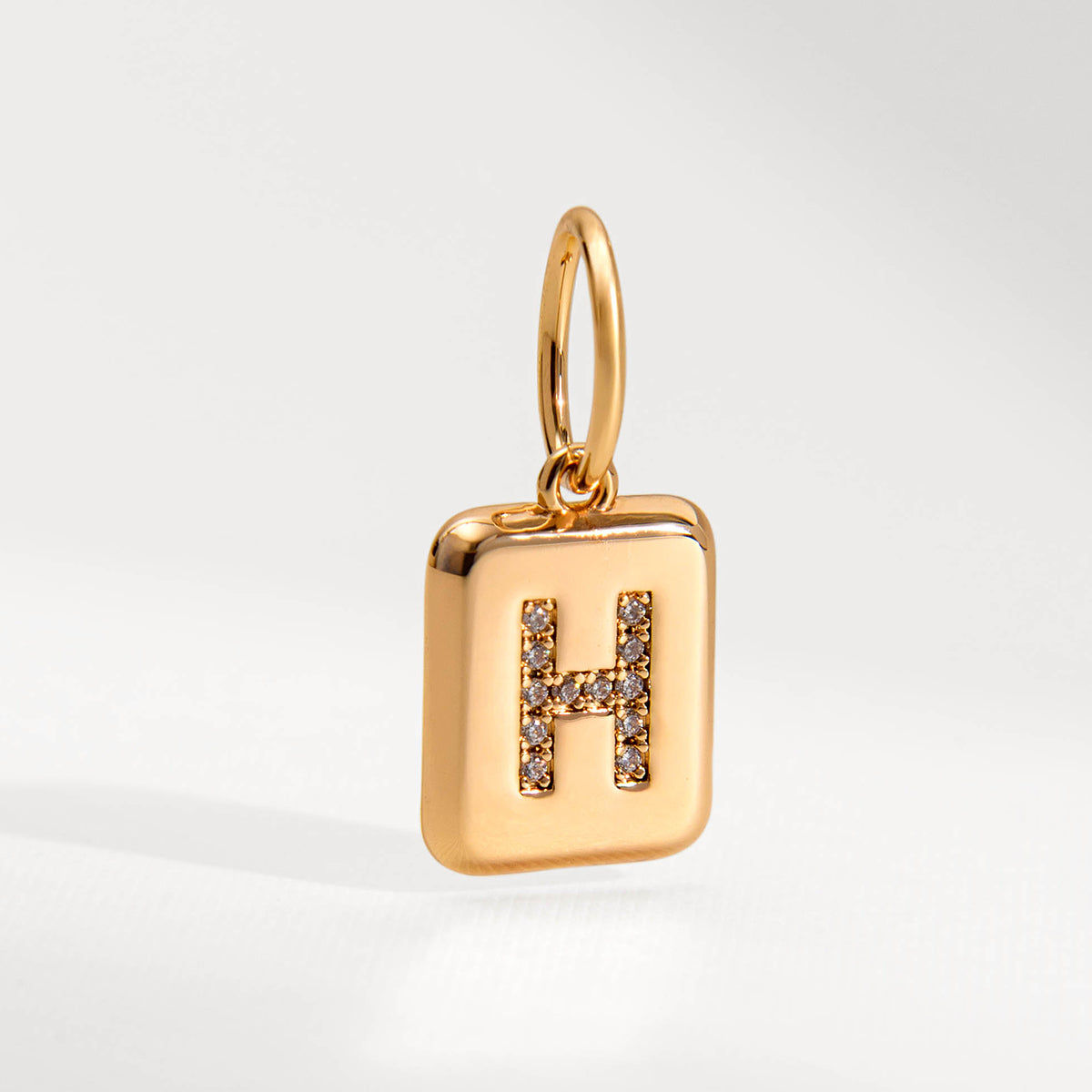 PINGENTE CHARM BAR H DOURADO