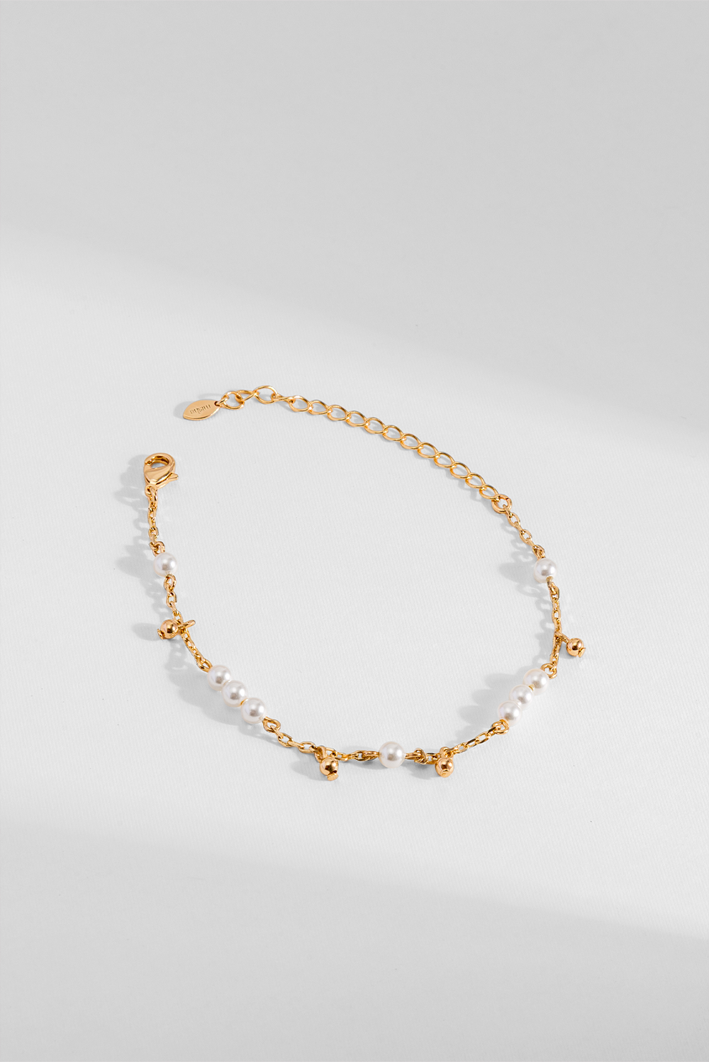 PULSEIRA BLUSH PÉROLAS DOURADO